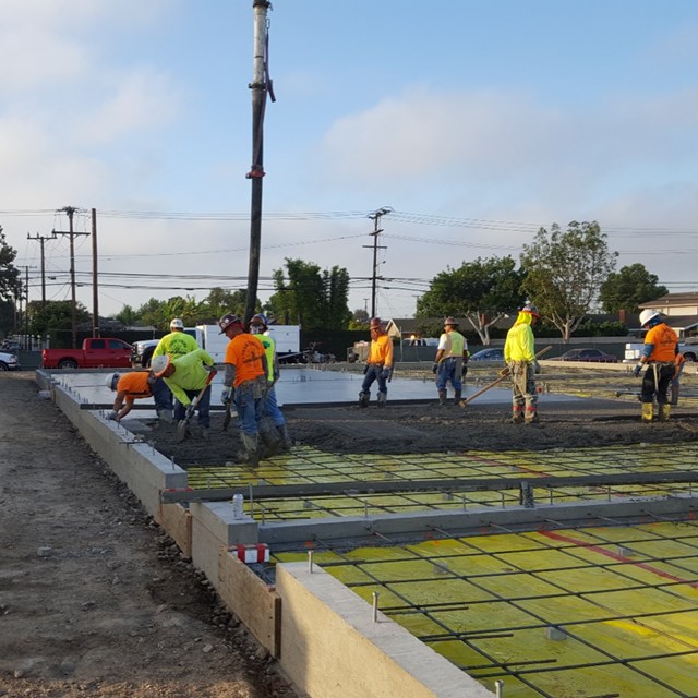 Concrete being poured for second set of buildings at Pacifica.